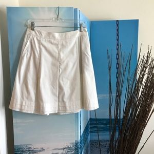 White pleated skirt
